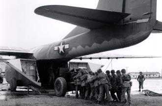 Members of the 1st Air Commando Group in India gather for a photo before taking off on a glider mission in Burma.