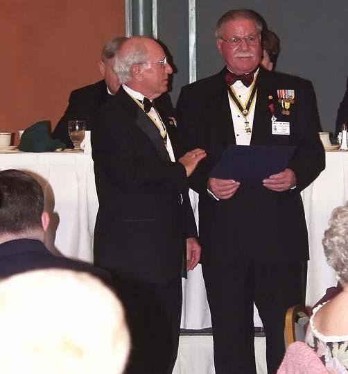 Distinguished Service Medal Outgoing ALSSAR president Price Legg, left, presents Jim