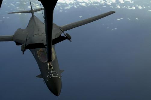 USAF photos by SSgt. Shane Cuomo USAF photo by TSgt. Cedric H. Rudisill Top, a B-1B refuels over the Indian Ocean.