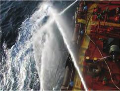 Water cannons deliver water in a vertical sweeping arc and protect a greater part of the hull.