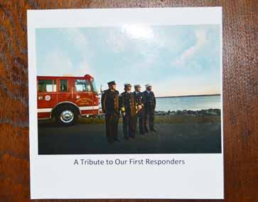 FLOTILLA 3-10 HONORED AS A FIRST RESPONDER (cont) A commemorative Tribute to Our First Responders booklet was presented to all participants and many of the