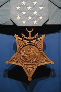 The actions earned Daly a recommendation for yet another Medal of Honor a record third but military brass ultimately opted for the Distinguished Service Cross instead.