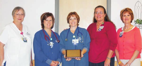 Ozarks Medical Center 3 Nurses of the Year Ozarks Medical Center recently presented Nurse of the Year Awards to four outstanding nurses who
