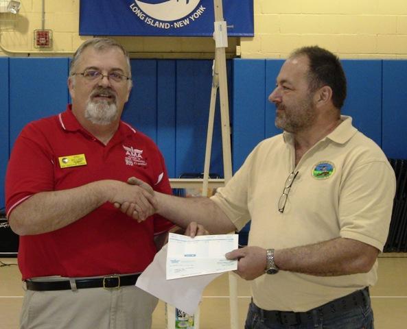 Academy of Model Aeronautics (AMA) District Vice President Eric Williams presented two awards at the West Babylon Community Youth Center to The Edgewood Flyers, Sunday March 25,