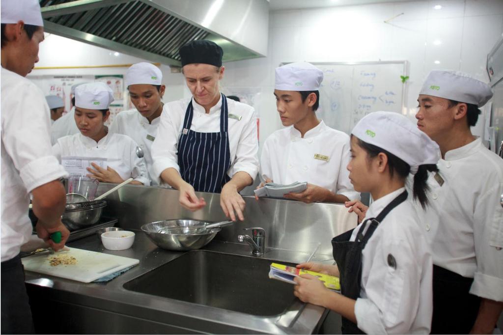 AVID Kitchen Trainer Ruth Byham, running a commercial cooking class for trainees at the KOTO