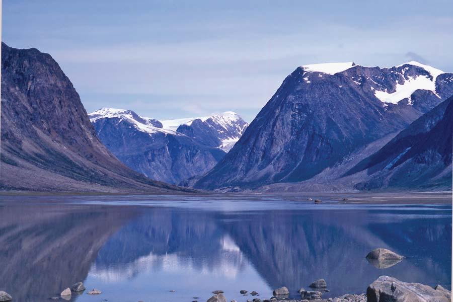 NEWS HIGHLIGHTS CONTINUING A LEGACY IN CANADA S NORTH Entering the Arctic Circle: mountains 30 km north of Pangnirtung, Nunavut. John Burgess, and published in Doctor to the North.