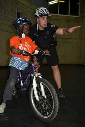 Children pedal up thrills and skills at Bike Safety Festival This May, the EPS and the Alberta Motor Association (AMA) hosted a bicycle safety festival to ensure children in need have the knowledge,