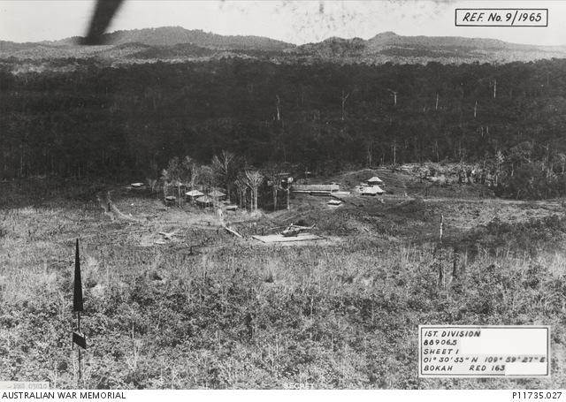 Bokah, with the Indonesian Border in the background. The cleared area in the foreground is the drop area for parachute resupply. or routes likely to be used by border crossers.