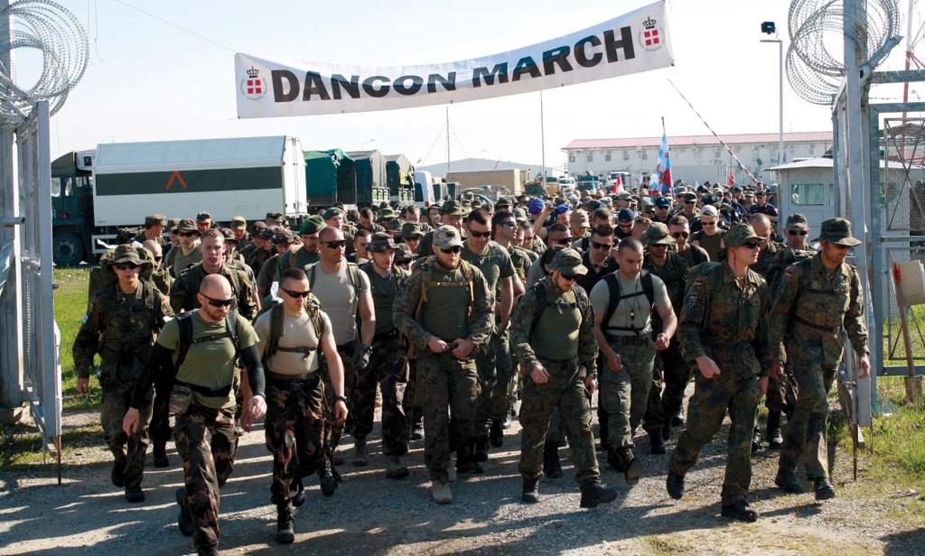 DANCON DANCON MARCH On the 26th of April at CAMP MARECHAL DE LATTRE DE TASSIGNY, Kosovo - more than 500 soldiers from 22 different nations gathered on a sunny day to participate on the Danish