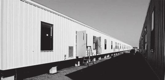 Figure 3: Pictures of Relocatable Facilities Arriving and Being Installed at a Defense Installation Source: DOD.