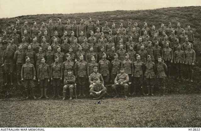16 October 1914: Group photograph of A Company, 2nd Battalion, AIF, at Kensington, Australia. Seated entre front is Sergeant M.J. Cotton. (Donor J. Cotton) In Memory of Private F.