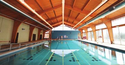 Aquatics ROSWELL ADULT AQUATIC CENTER Serving citizens 25 years and older and children and adults with disabilities, this indoor, heated therapeutic pool boasts five lap lanes, a zero-depth entry, a