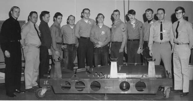 The photo is captioned, "The last B101 goes into retirement; SWD, NWS,Yorktown, VA Jan. 1972". Identified, left to right, the men are Lt.