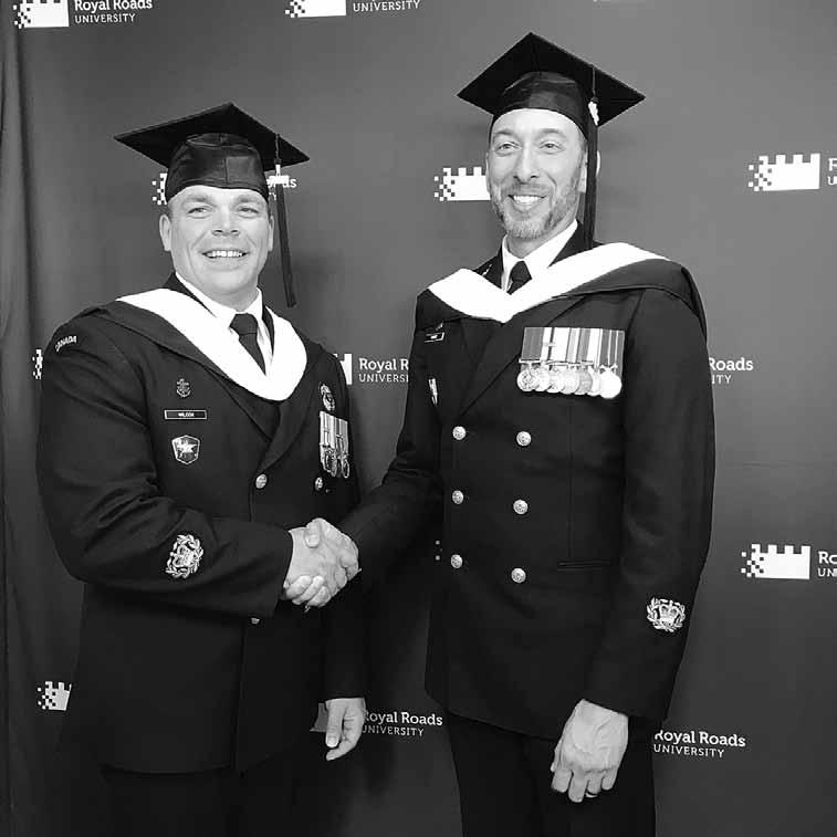 16 TRIDENT News July 9, 2018 Two sailors in a class of their own By Peter Mallett, The Lookout Staff CPO2 Wilcox (left) and CPO2 Andry congratulate each other upon receiving their Master s degrees