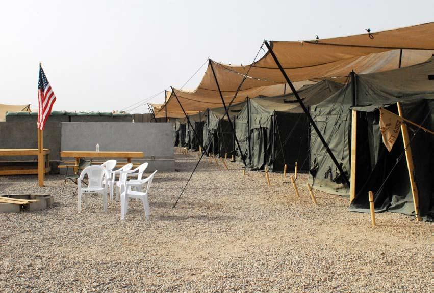 Soldiers from C Troop, 1st Squadron, 10th Cavalry Regiment, 2nd Brigade Combat Team, 4th Infantry Division, live in air-conditioned, hard-floored tents on FOB Minden.