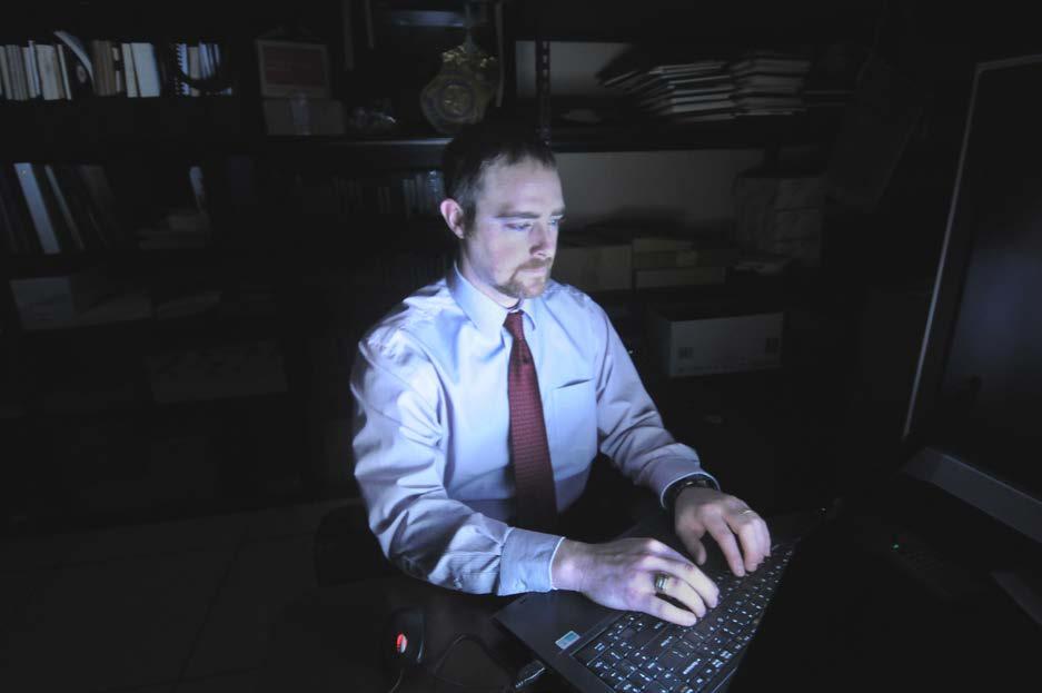 5-5-5 CCIU Special Agent Edward Labarge, an agent with the Computer Crimes Investigative Unit (CCIU) at Quantico, VA, conducts investigative research