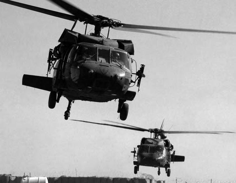 UH-60 Black Hawk helicopters from 2nd Squadron, 6th Cavalry Regiment, lift off from FOB McHenry, Iraq, carrying Soldiers from 2nd Battalion, 27th Infantry Regiment, for an aerial patrol over the