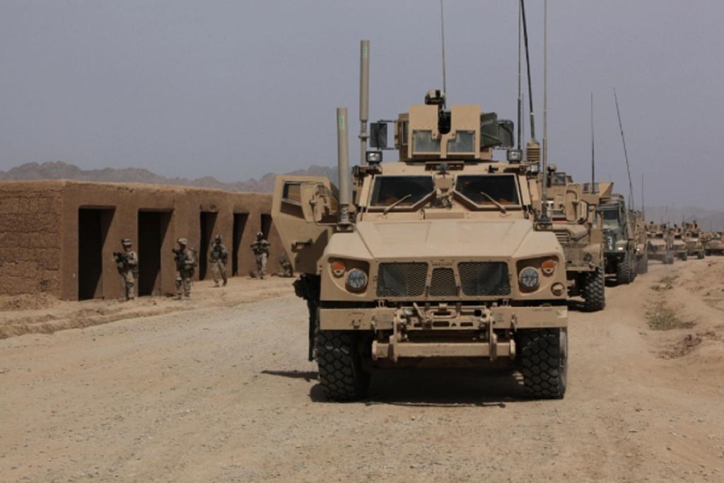 2 of 16 4/28/2010 2:49 PM Marines roll through the Salaam Bazaar in Helmand province heavily manned. Enemy contact was imminent as they patrolled through the known Taliban stronghold.