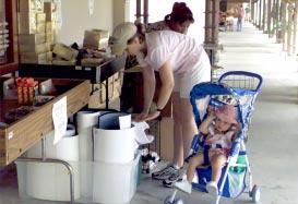 WEATHER Courtesy of Aeromet Optometrist visit set for November From Kwajalein Hospital Sun Moon Tides Shopped and dropped Young Olivia Wolcott, 1, plays with her hat as mom, Jennifer Wolcott, looks