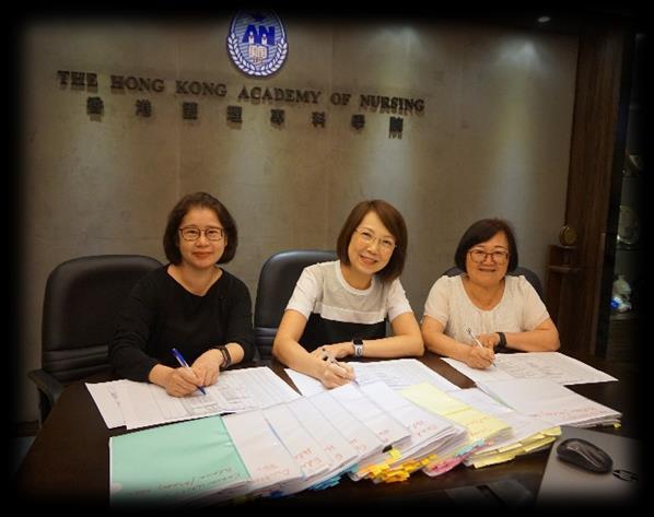 Fellow Recognition Award Vetting The Panel Judges : Ms. Annie CHAN, Ms. Macy CHAU and Ms. Helena LI are putting their heads together to study the applications on 11 August 2018.