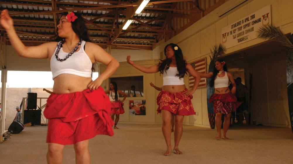 Soldiers of Taji O Toa, translated from Samoan to Warriors of Taji, perform a traditional Pacific Island dance during the Asian Pacific American Heritage Month celebration at the Sgt. John M.