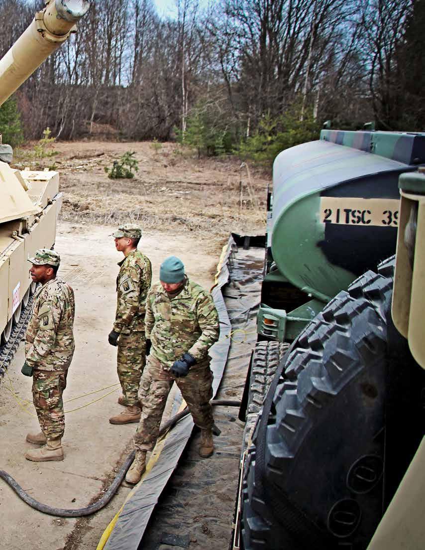 Petroleum supply specialists from the 16th Sustainment Brigade refuel vehicles assigned to regionally allocated forces