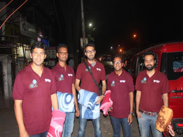 distributing blankets to the needy people on the streets of Pune