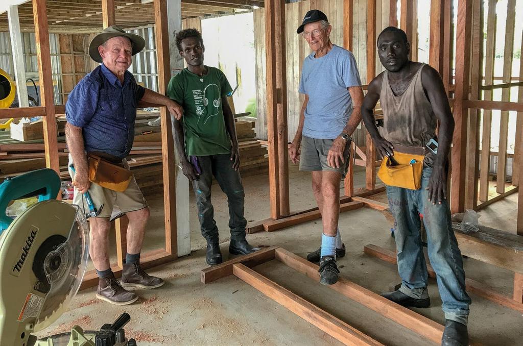 Two apprentices with Tom Stewardson, of the Rotary Club of South Gladstone, Qld, left, and John Dillon, of the Rotary Club of Woombye Palmwoods, second from right, who have worked with project