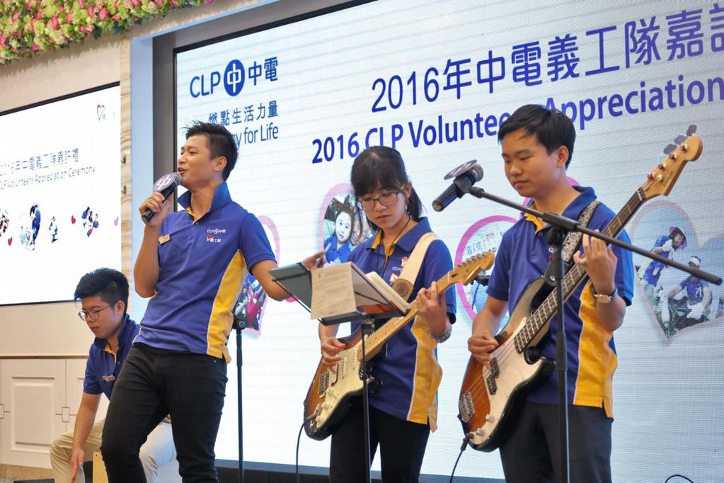 Photo 7 A band of CLP Power volunteers entertain guests at