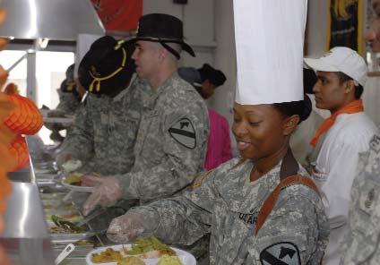 Page 4 By Pfc. April Campbell 27th PAD CAMP LIBERTY, Iraq The line into the Pegasus Dining Facility was longer than usual at lunchtime on Thanksgiving Day this year.