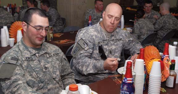 Maj. Brian Meyers, the top noncommissioned officer with the Falcon Brigade, during a Thanksgiving meal at Coalition Outpost Callahan in Baghdad s Adhamiyah District, Nov. 22.