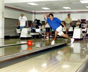 Bowling center getting new look, programs By Peter Rejcek (Photo by Peter Rejcek) Bowler John Tompkins is helping to turn the Kwajalein Bowling Center into a place where
