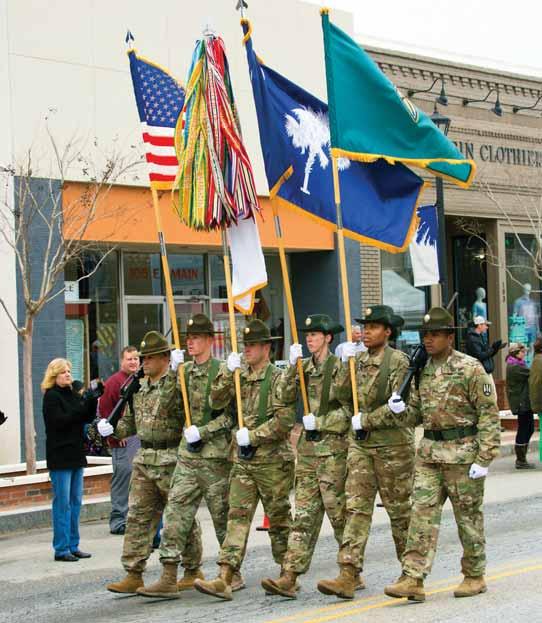 Lexington goes green A COLOR GUARD from the 3rd Battalion, 39th Infantry Regiment, above, parades the