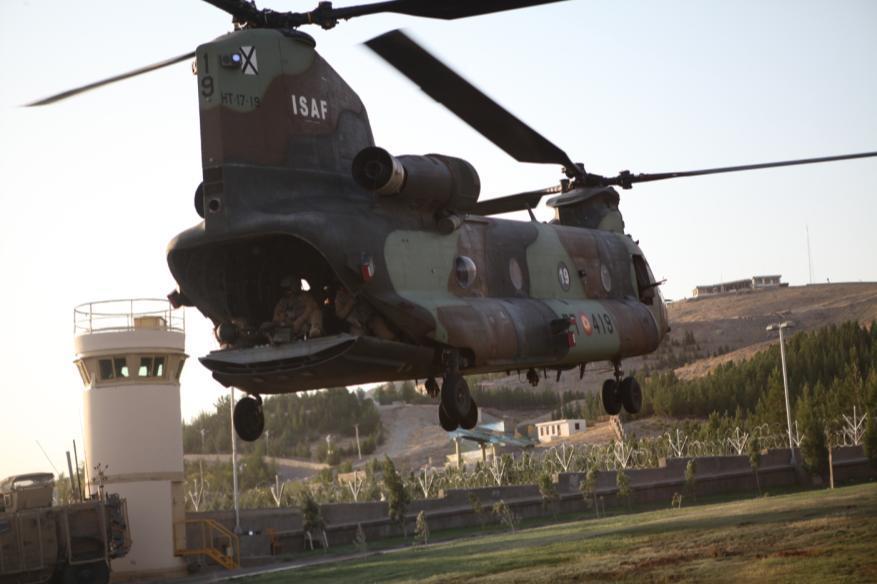 A CH-47 Chinook lands on the lawn of the U.S. Consulate in Herat province, Afghanistan, Se