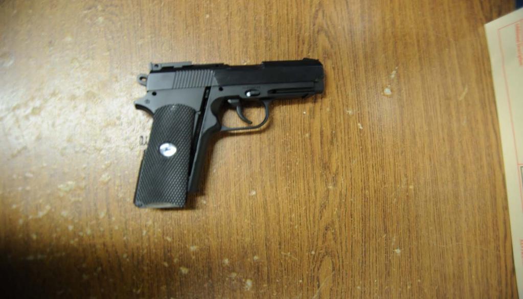 Image 8b: CSI photo of Hoffman s Colt Defender Airsoft BB Gun B. Other Witness Statements On January 4, 2015, at about 5:16 p.m., SFPD Officer Victor Silveira, Star # 1373, exited the south entrance doors to the Mission District Station parking lot.