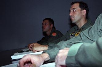 derivative of the F-16. At right is Capt. Nadir Ruzzon, training to be an F-16 instructor in the Italian Air Force.