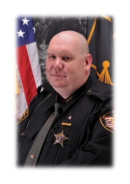 54 DEPUTY OF THE YEAR (Certificate and black/orange award bar) Aaron has been with the Union County Sheriff s Office since 1998.
