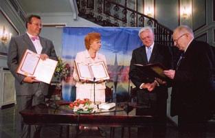 Professor Jānis Stradiņš being congratulated on the occasion of his 80th birthday by Ojārs Spārītis, President of the