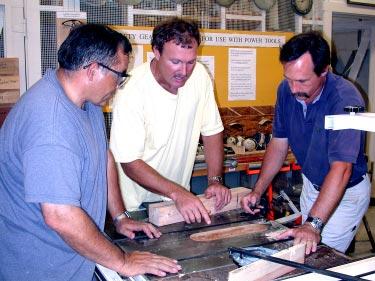 WEATHER Courtesy of Aeromet Sun Moon Tides (Photo by KW Hillis) Hobby Shop coordinator David Boyd, center, gives safety and use tips about the table saw to Uvaldo Ordonez, left, and Art Ottman, both