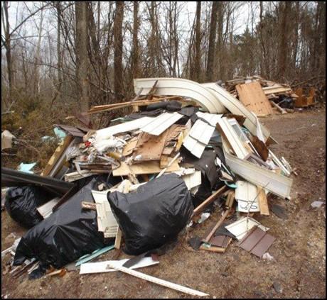 ENVIRONMENTAL HEALTH When a solid waste complaint is received an inspector is assigned the complaint to investigate. This photo shows illegal dumping of solid waste at property in Hunterdon County.