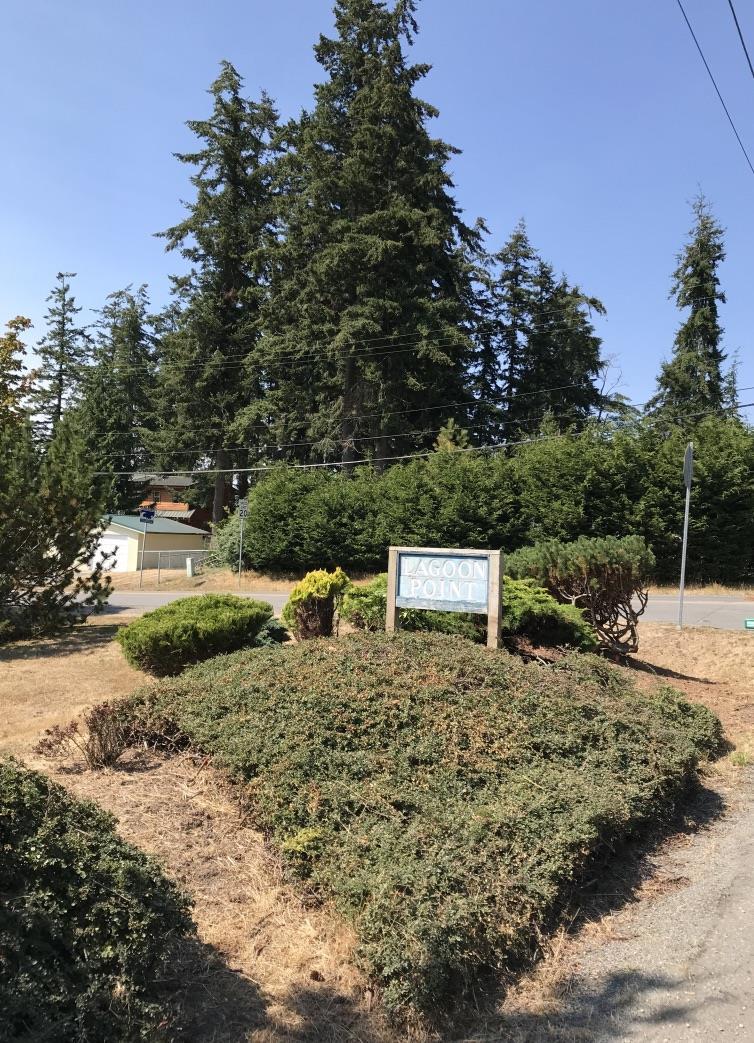 Much Needed Landscaping: by Duane Rawson, President We can see the Lagoon Point Sign Again!