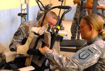 Rebekah Malone 225th Eng. Bde. PAO BAGHDAD Providing wheelchairs for Iraq s disabled children is a huge undertaking.