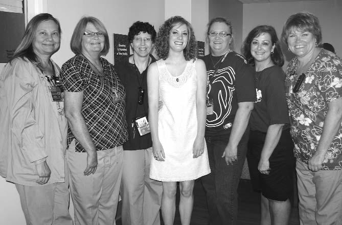 NICU Patients, Parents Attend Annual Reunion McKinzie Mackey (center), 20, of Blue Springs, enjoys visiting with staff members (from left) Brenda Brassfield, Susan McAnally, Cami Barritt, Missy