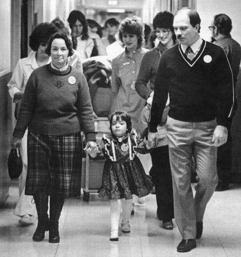 Katie Beckett and her parents - 1983 History