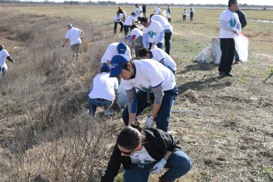 Love of the Earth Employee Volunteers at a Clean Up Event Daikin Park Establishing Roots in our Community and Sharing Japanese Culture