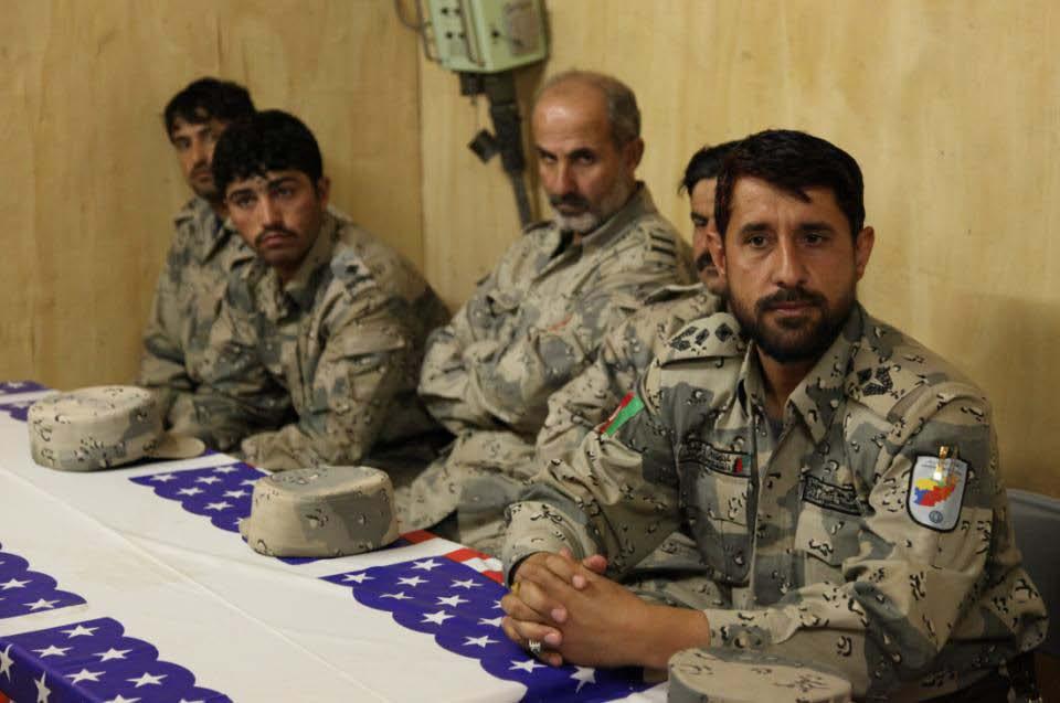 Local Afghan Border Police Commander and his subordinates during a key leader engagement held at Forward Operating Base