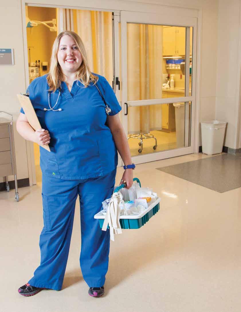 Krista Mabry treats each patient like a new friend ER Nurse Krista Mabry ER Nurse Krista Mabry wears a necklace with a silver charm in the shape of Africa, a reminder of the weeks spent there as a