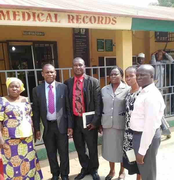 PHOTOGRAPH SHOWING FMCKEFFI CANCER REGISTRY STAF WITH VISITING FMOH TEAM MEMBERS FROM [L] - [R]: MRS JUSTINA AWOJE [REGISTRAR], DR.