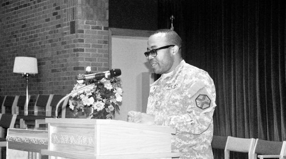 NEWS Give thanks Photo by Oithip Pickert, Public Affairs Office Chaplain (Maj.) Isaac Opara, the Catholic community pastor for Fort Jackson, speaks at a community Thanksgiving service Nov.
