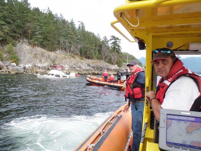 CCGA-P EXPANDS SCOPE OF TRAINING Canadian Coast Guard Auxiliary Expands Scope of Training Don Brodie, Russell Ayers-Berry and Trevor Reid of Auxiliary 14 - Gibsons respond to a sinking vessel near